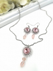 Set elegant cu cristale și inox Set elegant cu cristale și inox